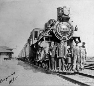 Train Engine #2000 with crew & train station at Empress