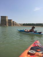 Kayaking on South Saskatchewan River by old train bridge